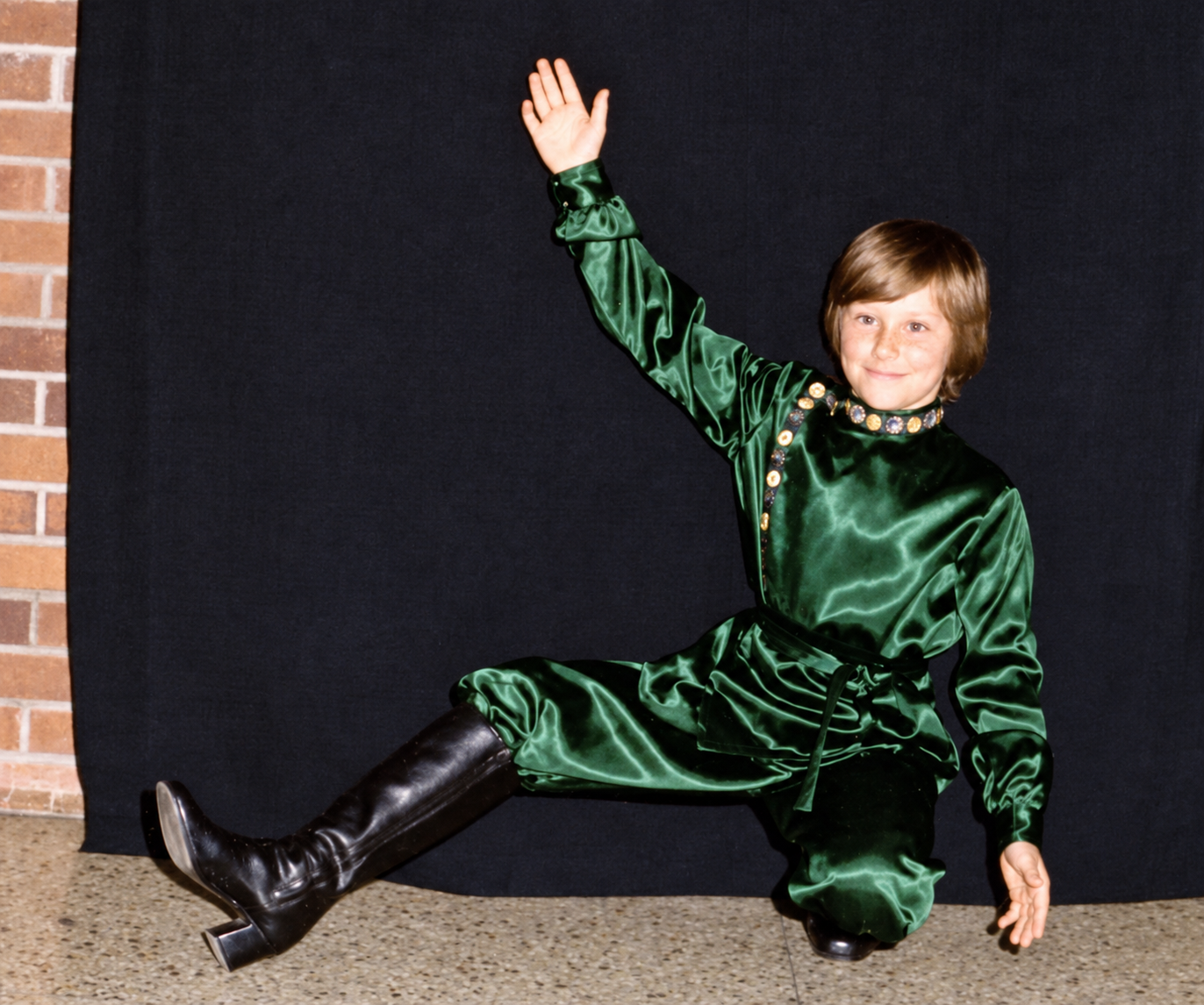 Jo as a teenager in a green folk-dance costume